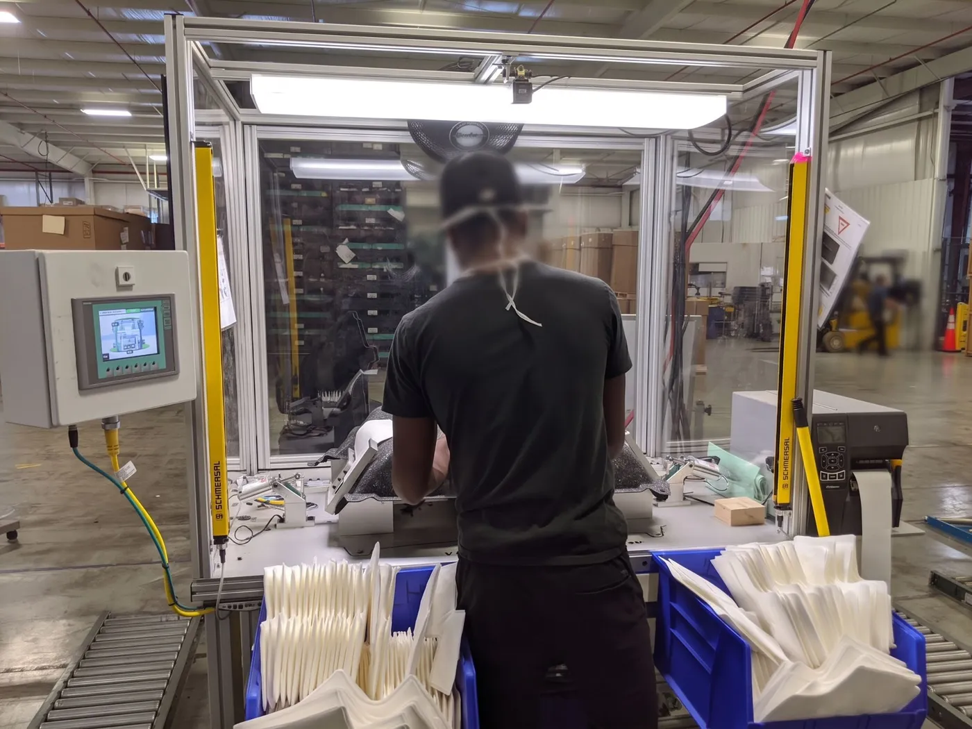 Poka-yoke assembly verification station in production with vision checks